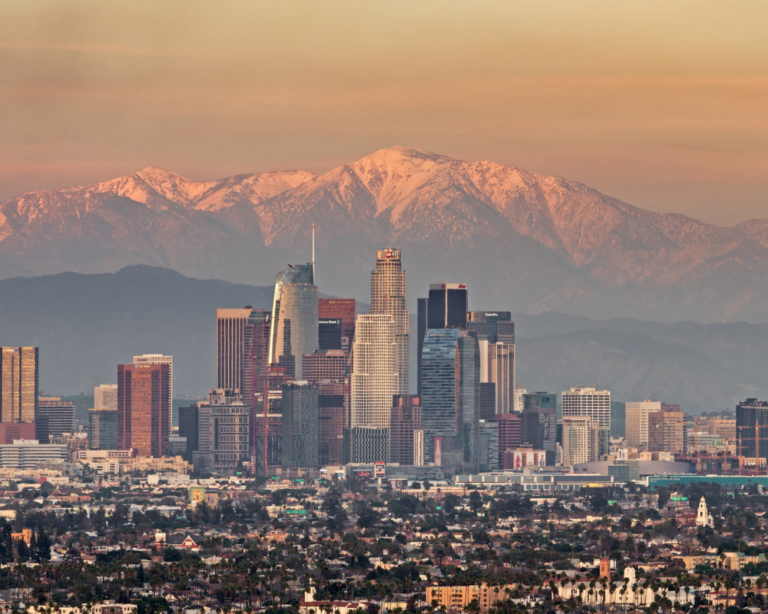 LOS ANGELES SKYLINE WITH MOUNTAIN IN THE BACKGROUND